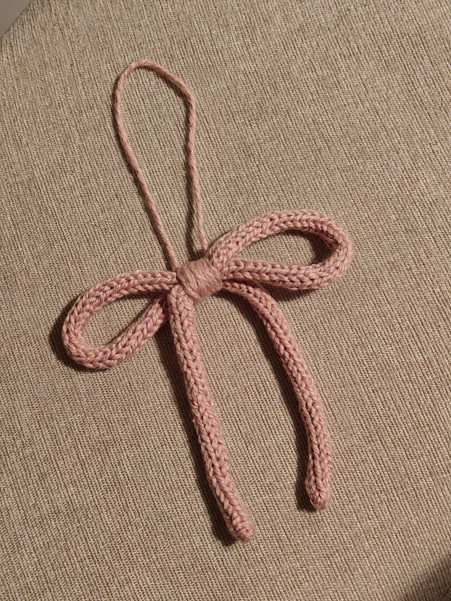 Ornement boucle tricot